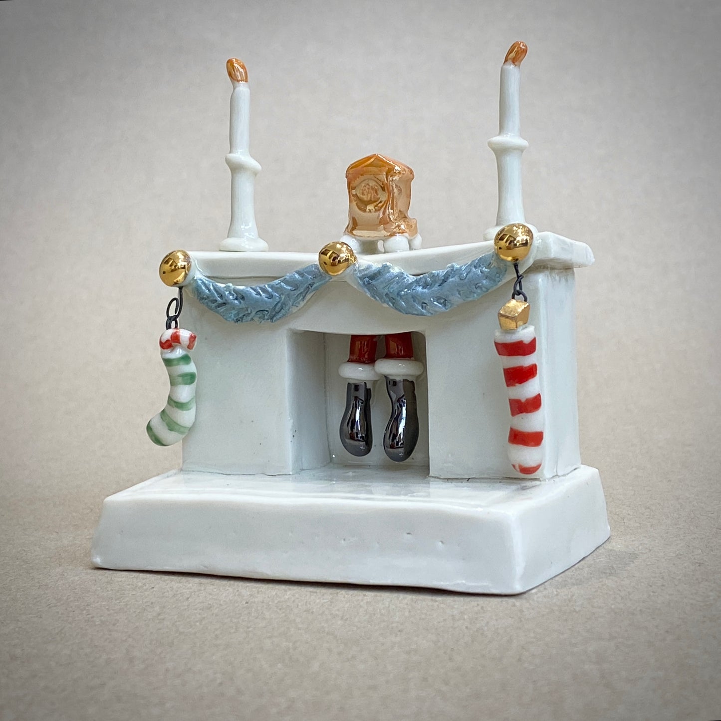 Father Christmas in fireplace