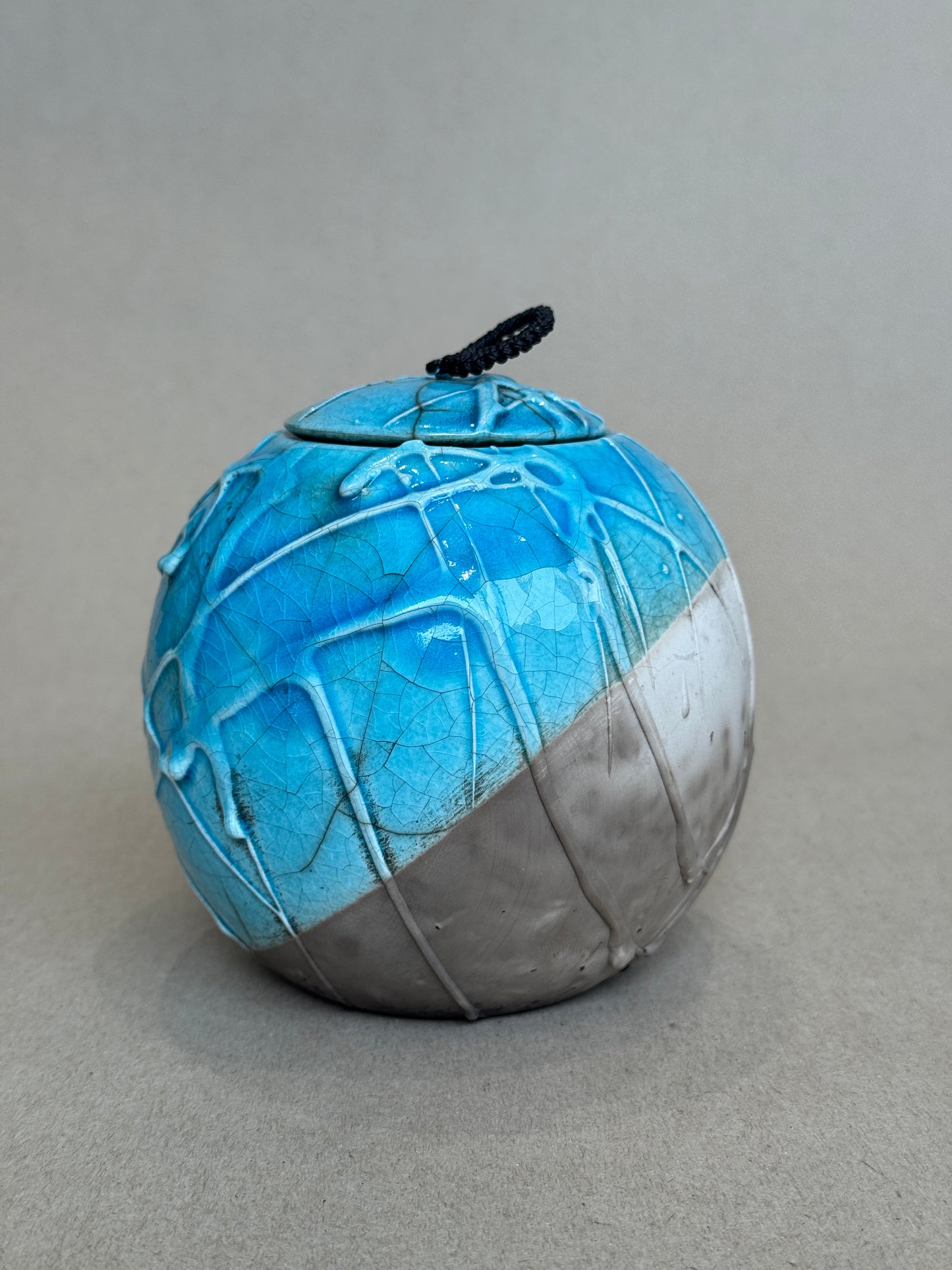 Medium Raku Fired Porcelain Jar (slip pour)