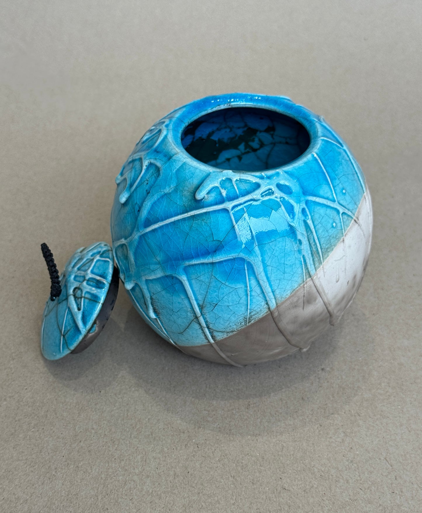 Medium Raku Fired Porcelain Jar (slip pour)