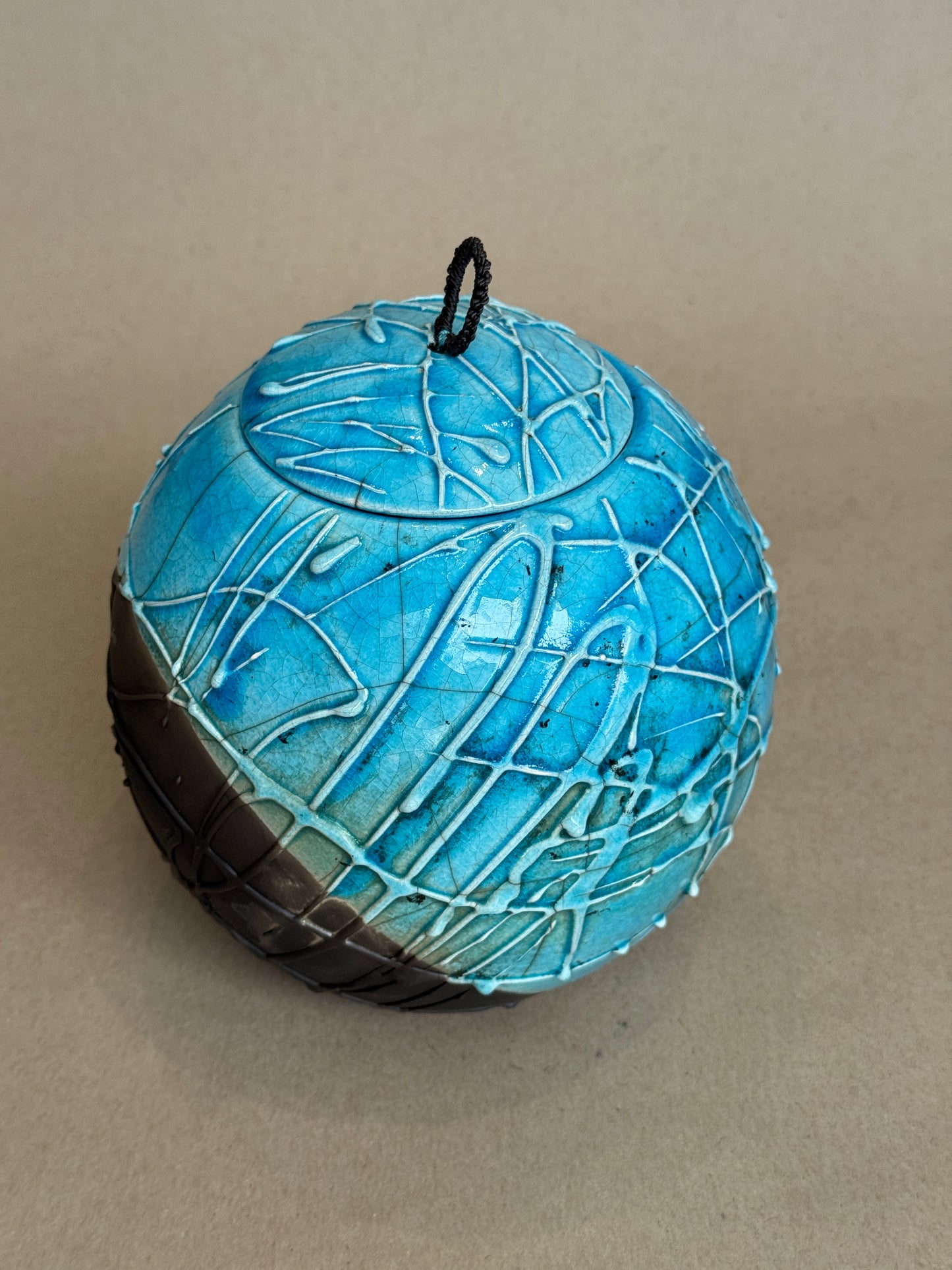 Large Raku Fired Porcelain Jar (slip pour)