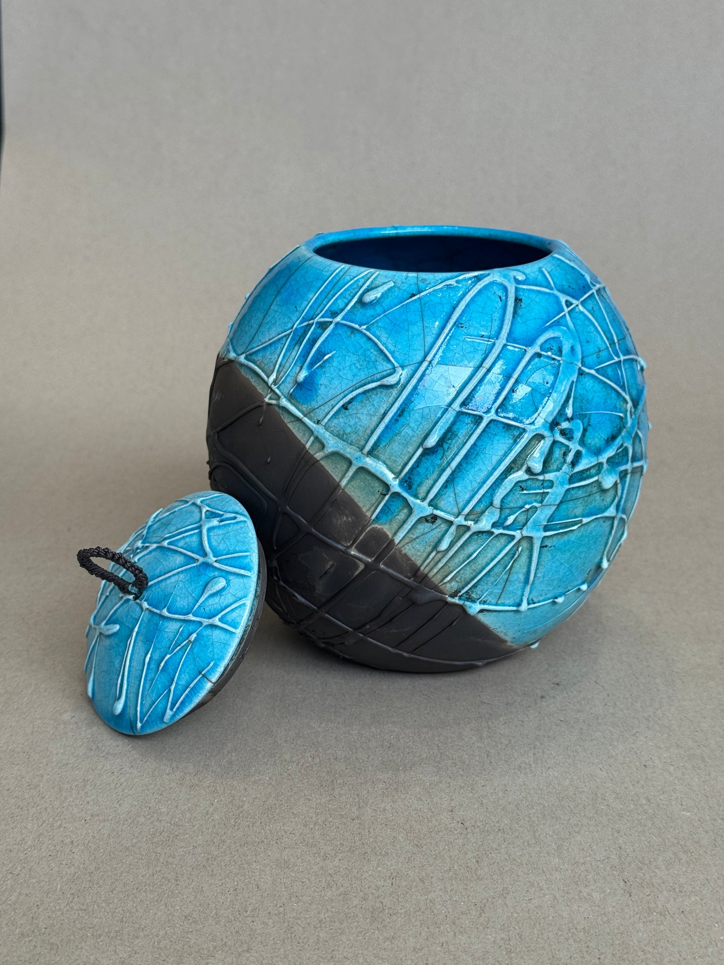 Large Raku Fired Porcelain Jar (slip pour)
